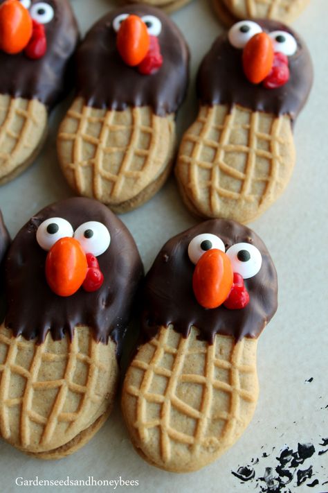 Nutter Butter Turkeys - Garden Seeds and Honey Bees Nutter Butter Cookie Turkeys, Thanks Giving Treats Desserts, Nutter Butter Thanksgiving Treats, Turkey Nutter Butter Cookies, Thanksgiving Cute Snacks, Thanksgiving Nutter Butter Cookies, Nutterbutter Turkey, Thanksgiving Fun Treats, Nutter Butter Turkey Cookies