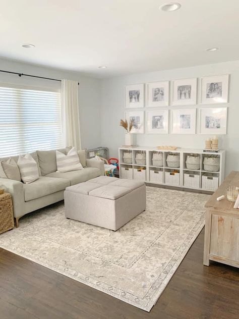 Small Basement Toy Room, Formal Living Playroom, Sitting Room Organization Ideas, Play Area In Front Room, Organized Play Area In Living Room, Play Storage In Living Room, Playroom In Formal Living Room, Playroom Behind Couch, Playroom With Couch Layout