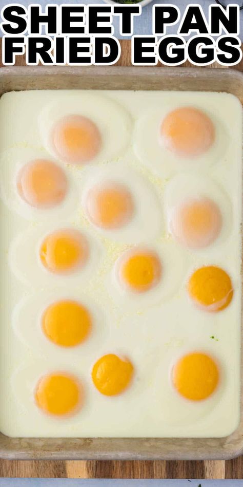 This Sheet Pan Fried Eggs Recipe (Sheet pan sunny side up eggs) is the perfect easy way to make a large batch of sunny side up (also known as fried eggs). Making sheet pan fried eggs makes meal prep and making breakfast or brunch for a crowd super easy. Baked Sunny Side Up Eggs, Sunny Side Up Eggs In Oven, Eggs On A Cookie Sheet, Make Ahead Fried Eggs, Easy Fried Eggs, Baked Eggs For A Crowd, How To Cook Sunny Side Up Eggs, Baked Scrambled Eggs Oven Sheet Pan, Fried Eggs For A Crowd