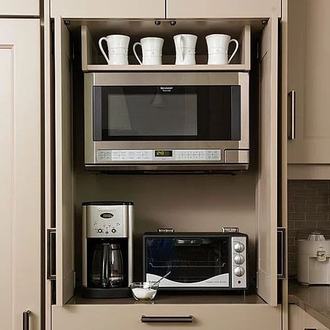 A microwave, coffeemaker, air fryer/toaster oven make a mini-kitchen in a nook. Microwaves In Kitchens Where To Put, Kitchen Microwave Cabinet, Microwave Toaster Oven, Balcony Modern, Microwave Cabinet, Oven Cabinet, Coin Café, Minimal Kitchen, Add Storage