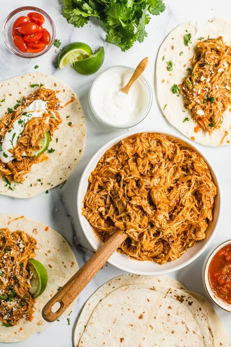 This super easy chipotle slow cooker pulled chicken recipe is a family favorite and it couldn't be easier to make. Chipotle Pulled Chicken, Mexican Pulled Chicken Slow Cooker, Chipotle Chicken Slow Cooker, Chipotle Chicken Crockpot, Crock Pot Chipotle Chicken, Pulled Chicken Crock Pot Recipes, Slow Cooker Pulled Chicken, Pulled Chicken Recipe, Crockpot Pulled Chicken