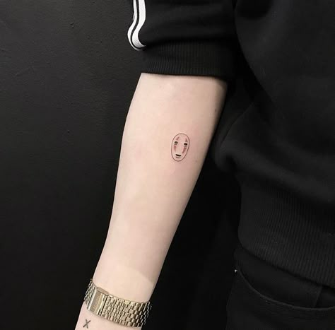 Small Tattoos Studio Ghibli, Small No Face Tattoo, Studio Ghibli Tattoos Small Minimalist, Studio Ghibli Tattoos Fine Line, Ghibli Tattoo Minimalist, Tattoo Soot Sprite, Small Soot Sprite Tattoo, No Face Tattoo, Chakra Tattoo