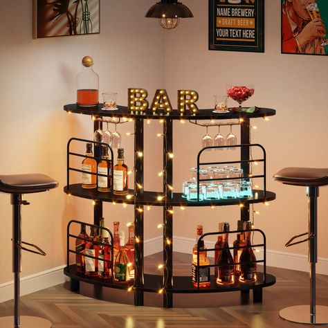 PRICES MAY VARY. Large Open Storage Space: This 3-tier liquor bar unit with curved design and 2 large shelves offer ample space to store items, 4 front guard rails keep items from accidental spill. It’s suitable for displaying wine and wine accessories, meeting your storage needs Durable and Stable Construction: This bar cabinet is consisted of solid metal frame, wear-resistant MDF material. The thick metal frame makes it sturdy enough and has strong load-bearing capacity. 6 Legs make it more st Liquor Bar Cabinet, Shelves Corner, Alcohol Bar, Home Kitchen Bar, Corner Bar, Home Bar Rooms, Bar Unit, Cabinet With Storage, Liquor Bar