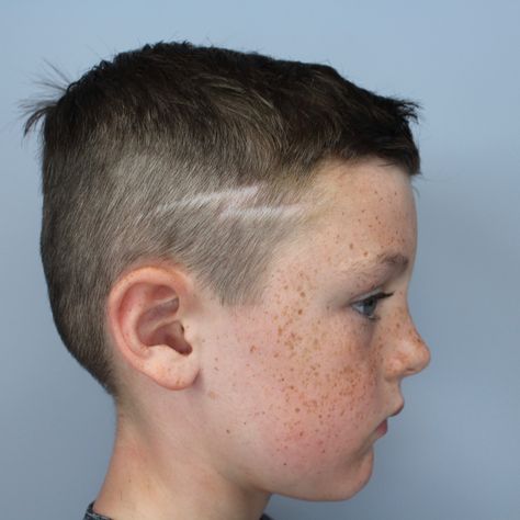 Hadley gave this little guy an awesome lightning bolt shaved on his side ⚡️⚡️⚡️ Lightning Bolt In Hair Boys, Little Boy Haircut Design On Side, Lightning Hair Design, Boys Hair Lightning Bolt, Boys Haircut Lines On Side, Lightening Bolt In Haircut, Lightning Haircut, Lighting Bolt Hair Design Boys, Boys Shaved Haircut