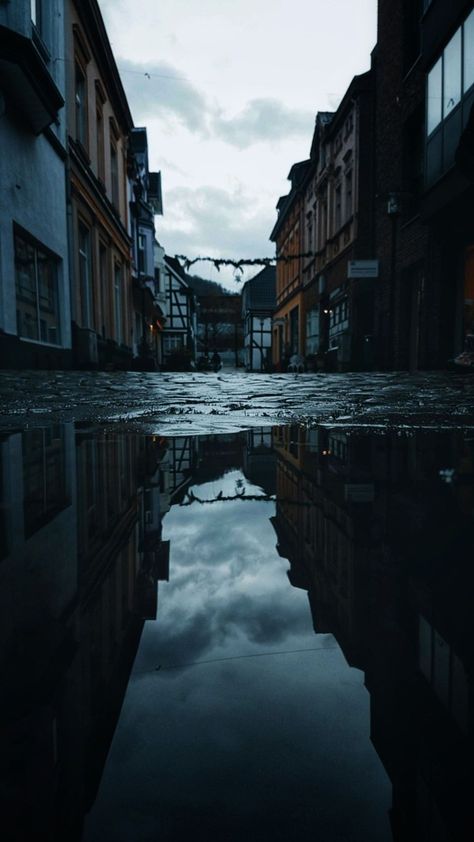 Dark street reflected in a puddle. Worms Eye View Photography, Worm's Eye View Photography, Cobblestone Walkway, Fish People, Asphalt Plant, Worms Eye View, Film Shots, London Brick, City Streets Photography