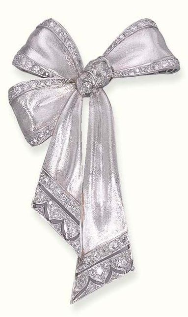 AN ART DECO DIAMOND-SET RIBBON BOW BROOCH. The brushed white bow, with old mine-cut diamond trim, gathered by old European-cut diamonds, to the pierced terminals, circa 1928. #ArtDeco #brooch Bijoux Art Deco, Diamond Ribbon, Ribbon Jewelry, Edwardian Jewelry, Bow Brooch, Bow Jewelry, Diamond Brooch, Deco Jewelry, European Cut Diamonds