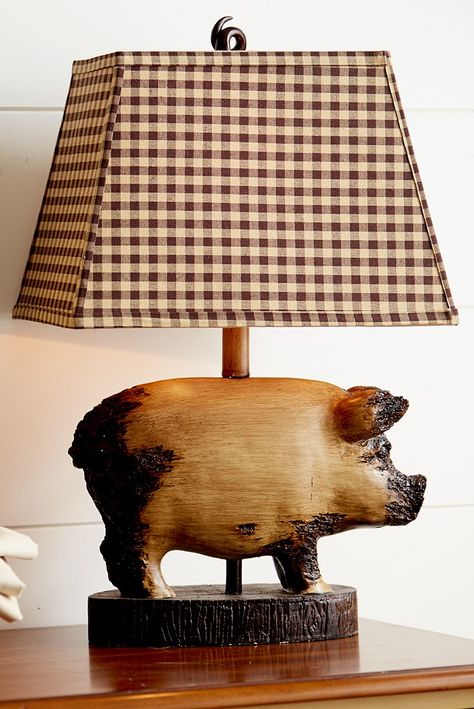 From the tip of the distressed pig figure’s nose to the curly tail finial atop the checkered shade, Pier 1’s Rodney the Pig Accent Lamp offers a chic farmhouse feel to end tables, nightstands and reading nooks. And you won’t have to break your piggy bank to get it. #pier1love #farmhousedecor #farmhouseliving #farmhouse #farmhousedesign #farmhousechic Pig Lamp, Pig Kitchen Decor, Brown Gingham, Farmhouse Lamps, Pig Decor, Farm House Colors, Country Theme, Reading Nooks, Decorative Table Lamps