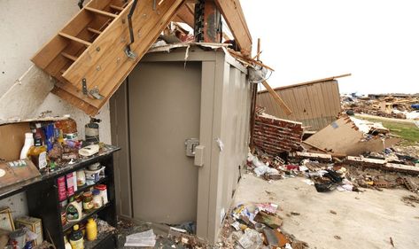 Oklahoma tornadoes: Aboveground shelters stood up in face of EF5 Moore tornado. Aboveground storm shelters held up exceptionally well in the tornado and could be a better choice than a traditional underground storm cellar, said Larry Tanner, a research associate at the National Wind Institute at Texas Tech University Above Ground Tornado Shelter, Ef5 Tornado, Above Ground Storm Shelters, Tornado Safe Room, Storm Cellar, Tornado Season, Root Cellars, Storm Shelters, Oklahoma Tornado