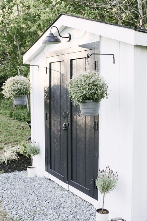 Side Of Shed Decor Exterior, Small Farmhouse Landscaping, Backyard Shed Exterior Ideas, Landscaping Ideas Farmhouse, Shed Shutters Diy, White Shed Ideas, How To Decorate A Shed Outside, Shed Planting Ideas, Planters Around Shed