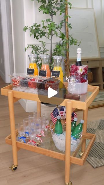 Carol & Ale on Instagram: "Easy Mimosa Bar 🍾🍊 perfect idea for your next 4th of July party! Comment SHOP and we’ll send you a DM to shop everything we used, or click our link in bio

We always put together this cute mimosa bar and our guests
LOVE it! Use this chiller to add your favorite fruits, a few different juices, a wine chiller and your favorite glasses. I also add a bucket of sparkling water for non-alcoholic mimosas

Make this for your next party, or to enjoy patio season!

#mimosabar #entertainingathome #entertaininginstyle #outdoorentertaining #outdoorentertainment
#creativerecipes #creativeideas #outdoorliving #partyideas #homeblogger #barcartstyling #barbecueparty #bridalshowerideas #mothersdaybrunch #4thofjulyparty" Easy Mimosa Bar, Cute Mimosa, Mimosa Bar Ideas, Easy Mimosa, Non Alcoholic Mimosa, Bar Cart Styling, Barbecue Party, Mimosa Bar, Mothers Day Brunch