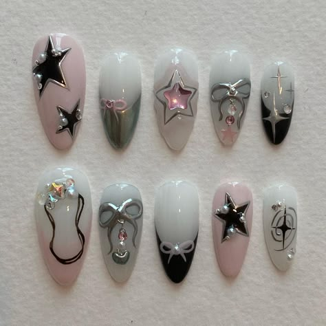 custom set ; flora fantasy ✧･ﾟ: *✧･ﾟ:* #winx #instagram #floranails #trending #floral #viral #explore #cottagecore #explorepage #tiktok… | Instagram Pink Trending Nails, Black Pink Chrome Nails, Black Pink Inspired Nails, Y2k Coquette Nails, Chrome Coquette Nails, Star And Bow Nails, Mixed Match Nails, Black Pink White Nails, Goth Coquette Nails