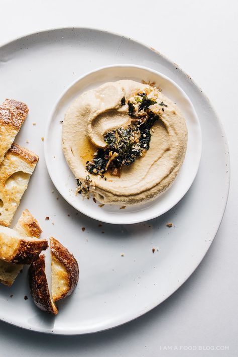 White Miso Hummus Miso Hummus, Furikake Recipe, Miso Recipe, White Miso, Queso Dip, Crispy Onions, Hummus Recipe, White Plate, Salsa Verde