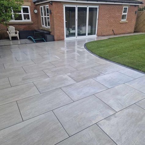 An incredible garden using our Aged Kandla Grey porcelain paving. Norwood Landscapes work in and around the Selby area, creating beautiful gardens in both Sandstone and Porcelain. 📞 Call our team on 01977 782240 💻 Visit our website https://rflandscapeproducts.co.uk/product/aged-kandla-grey-2cm-porcelain-paving/ Details ✔️ Product : Aged Kandla Grey Paving Format: 600x900mm Material: Porcelain Paving Credit - Norwood Landscapes . . . ✔️ Trade accounts available ✔️ Sample kits availabl... Walkway Pavers, Grey Paving, Porcelain Paving, Patio Garden Design, Walkway, White Porcelain, Patio Garden, Beautiful Gardens, Grey And White