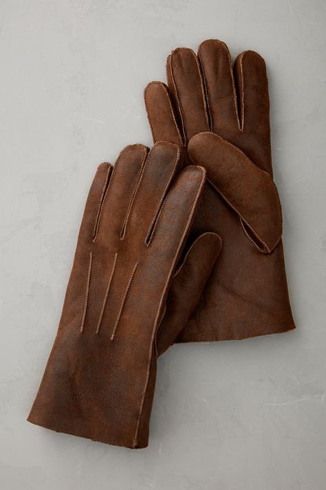 Slip your hands into our men's Burr sheepskin gloves and experience unrivaled warmth and ultimate comfort. Crafted of prized Spanish Merino sheepskin, these exquisitely designed gloves have an heirloom-quality finish and handstitched details that allow them to pair well with a leather or shearling coat or even a dressed-up blazer. Winter Gloves Men, Mens Leather Gloves, Mens Winter Gloves, Sheepskin Gloves, Gloves Men, Texas Chainsaw, Promo Gifts, Resort Outfit, Sheepskin Slippers