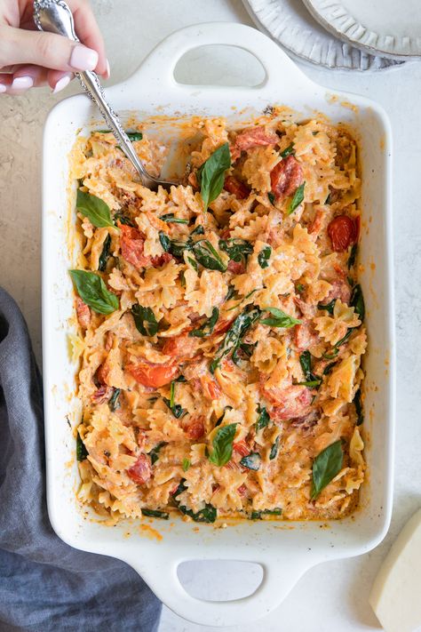 This Cream Cheese Pasta Bake is a simple recipe made by oven roasting a block of cream cheese with cherry tomatoes and a few other basic ingredients to create a creamy, flavorful sauce. #comfortfood #pasta #familydinneridea #dinnersforkids #tiktokpasta #creamcheesepasta #dinner #dinnerideas #creamcheesepastabake Pasta Bake Recipes With Cream Cheese, Baked Tuscan Pasta, Pasta Sauce And Cream Cheese, Red Sauce With Cream Cheese, Pasta With Cream Cheese Recipes, Tomato Cheese Pasta Bake, Tomato And Cream Cheese Pasta, Baked Pasta With Cream Cheese, Cream Cheese Tomato Pasta Bake