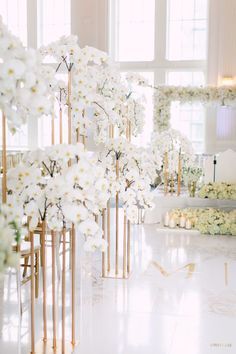 Orchid Decoration Wedding, Orchid Wedding Decor Reception Ideas, White Orchid Wedding Centerpieces, White Orchid Wedding Decor, All White Bouquet Wedding Orchid, Tall Centrepiece, Tall Plant Stand Indoor, Orchid Centerpieces Wedding, Tall Plant Stand