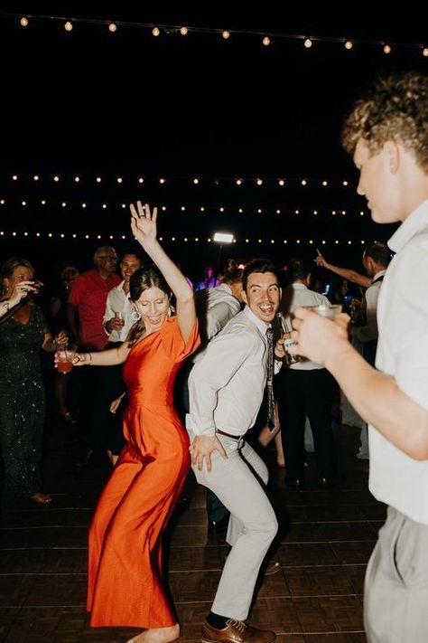 People dancing at an outdoor wedding reception in Florida. | Florida Wedding Photographer Reception Photo Inspiration, Reception Dancing Photos, Dancing Wedding Photos, Wedding Party Dancing, Wedding Reception Party Photos, Wedding Reception Dancing Photos, Wedding Guests Photography, Candid Wedding Photos Receptions, Wedding Guest Photography