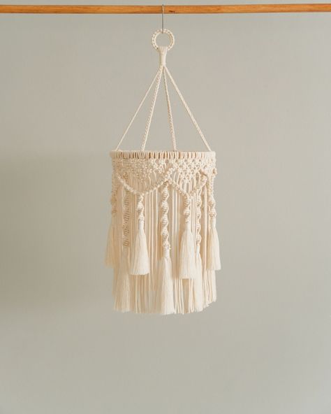 Ever come across that enchanting Macrame Hanging Lantern that just brings a smile to your face? 🌟💫 Found it recently and couldn't resist sharing the joy! It's more than just a pendant lamp – it's a beautifully crafted piece that seamlessly blends rustic and bohemian aesthetics into our living space. The intricate tassel chandeliers add an enchanting touch, casting a warm and welcoming glow. Perfect for our boho-inspired nursery, it effortlessly elevates our decor with its unique, handmade mac... Macrame Hanging Lantern, Woven Pendant Light, Lamp Boho, Macrame Nursery, Nursery Lighting, Boho Life, Bohemian Handmade, Macrame Hanging, Fan Lamp