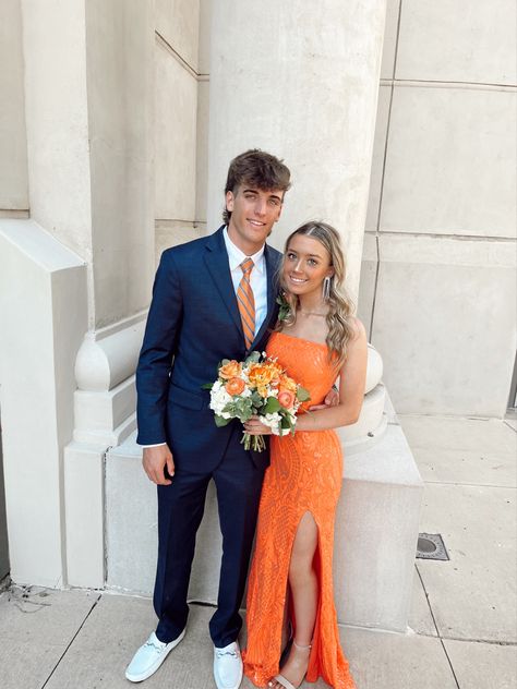 Orange Dress Prom Couple, Orange Prom Dress Aesthetic, Orange Prom Flowers Bouquets, Orange Homecoming Couple, Prom Picture Poses With Bouquet, Orange Prom Ideas, Orange Bouquet Prom, Prom Flowers Orange Dress, Prom Pics With Bouquets