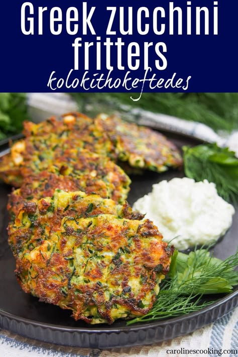 These Greek zucchini fritters, kolokithokeftedes, are a tasty combination of zucchini combined with bright herbs and gently salty feta. They're perfect to snack on or serve as a side, as well as being a great way to use up some zucchini. Mediterranean Zucchini Fritters, Zucchini Feta Spinach Fritters, Greek Zucchini Balls, Greek Courgette Fritters, Zucchini Feta And Spinach Fritters, Zucchini Falafel Recipes, Grated Zucchini Recipes Healthy, Greek Fried Zucchini, Zucchini Feta Fritters