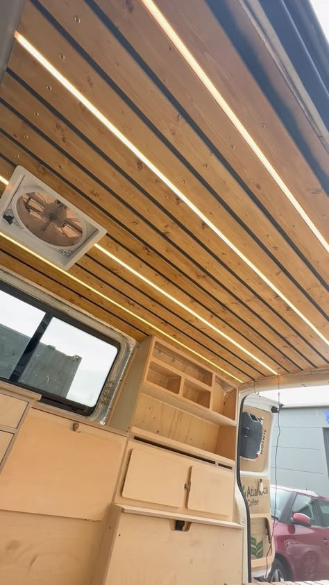 We finally have a finished ceiling! We have spent SUCH a long time staring at a shiny foil silver roof that we were beginning to think it might never change. But with the addition of some stained pine cladding slats and some LED strips, the roof has been completed transformed! This project is part of our full van conversion in our VW T5 into a camper. We’ve been making DIY how-to videos for each step for @triton_tools. The ceiling is part 6 of 7 and just dropped on the Triton YouTube channel. I Van Lighting Ideas, Camper Van Lighting Ideas, Diy Camper Roof, Campervan Roof Ideas, Camper Van Lighting, Camper Van Ceiling, Campervan Lighting, Campervan Ceiling, Camper Van Ceiling Ideas