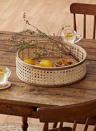 - The latest trend in today's country decors, caning!- The rustic rattan fibre is woven on a rounded bamboo frame and enhanced by a sophisticated herringbone braided bottom- Can be used as an elegant fruit basket or as a storage basket for towels and cosmetics- Wipe with a damp cloth as needed- 14" (36 cm) wide x 4" (10 cm) tall Herringbone Braid, Bowls And Plates, Rattan Tray, Organic Cotton Sheets, Wicker Tray, Boho Farmhouse, Bamboo Frame, Euro Pillow Shams, Latest Trend