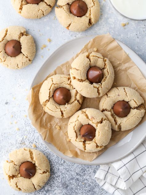 Classic Peanut Butter Blossom Cookies - Completely Delicious Peanut Blossom Cookies, Kiss Cookie Recipe, Peanut Butter Blossoms Recipe, Peanut Butter Kiss, Peanut Butter Blossom, Peanut Butter Kiss Cookies, Peanut Blossoms, Completely Delicious, Traditional Christmas Cookies