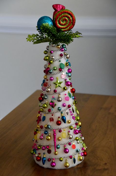 Sparkly Styrofoam Christmas Tree ~ wrapped with white snow material and decorated with mini ornaments  and mini garland Styrofoam Tree Crafts, Styrofoam Christmas Tree Ideas, Foam Christmas Ornaments, Cone Christmas Trees, Christmas Tree Decorations Diy, Christmas Tree Crafts, Christmas Decorations To Make, Mini Christmas Tree, Diy Valentines Crafts