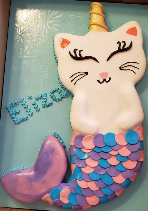 I blew up a picture from the internet and used it to cut out cake from a 1/2 sheet cake. Covered in fondant.  Cut out fondant circles for tail.  Piped on face. Kitty Mermaid Cake, Cat Mermaid Birthday, Purrmaid Cake, Mercat Birthday Cake, Mermaid Cat Birthday Party, Mermaid Cat Cake, Mercat Birthday Party, Mercat Cake, Purrmaid Party