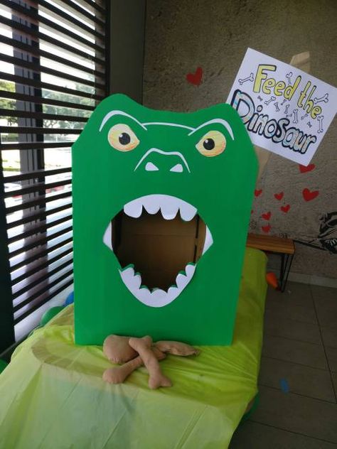 Feed The Dinosaurs party ideas. Inspired by many others Pinterest "Dino Party Theme" post Dinosaur Party Theme. Feed the Dinosaur. Dinosaur game. Dino tail. Dinosaur tails. Dinosaur theme photo prop frame. #DinosaurThemeParty #DinoThemeParty #FeedtheDinosaurGame #FeedtheDinosaur #DinoTails #DinosaurTails #DinoPhotoProp #DinoPhotoFrame #DinosaurPhotoProp #DinosaurPhotoFrame #DinosaurThemePartyGame #DinoThemePartyGame #DinosaurThemeGame #DinoThemeGame Feed The Dinosaur Game, Dino Themed Party Games, Toddler Dinosaur Party Games, Dino Party Photo Booth, Dinasour Birthday Games Party Activities, Feed The Dinosaur, Toddler Dino Party Games, Dino Theme Party, Dinosaur Party Theme