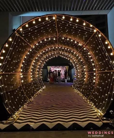 Grand March Entrance Ideas Prom, Marriage Venue Decoration, Party Plot Entry Design, Sangeet Stage Decor Indoor, Entrance Tunnel Wedding, Event Entry Gate Design, Sangeet Entrance Decor, Event Stage Design Backdrops, Sangeet Theme Ideas