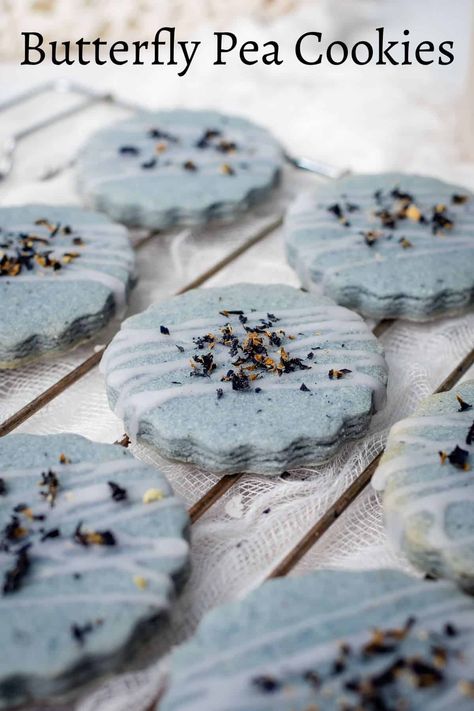 These butterfly pea cookies are rich and buttery with a lovely crumbly texture. They are naturally colored, very elegant and simply delicious! #butterflypeacookies #butterflypeacookie #butterflypeaflowercookies #butterflypeacookierecipe #bluecookies #bluematchacookies #decoratedtreats Butterfly Pea Cookies, Butterfly Pea Flower Dessert, Butterfly Pea Dessert, Butterfly Pea Flower Cookies, Butterfly Pea Flower Recipe, Butterfly Pea Recipe, Spring Cookies Recipes, Herb Desserts, March Cookies