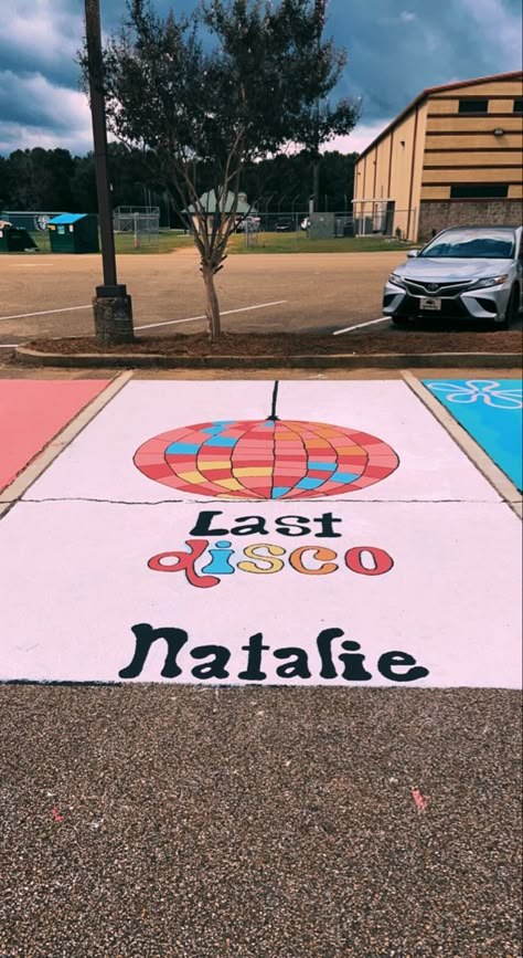 Last Disco Parking Spot, Senior Parking Sports Ideas, Dance Parking Spot, Senior Year Painting Ideas, Sports Parking Spot Painting, Senior Parking Spot Disco Ball, Orange Senior Parking Spot, Senior Brick Wall Painting Ideas, Retro Senior Parking Spot