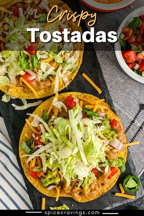 1 reviews · 15 minutes · Vegetarian Gluten free · Serves 4 · Crispy, crunchy corn tortillas topped with refried beans, cheese, salsa, guacamole and lettuce, these Mexican Tostada are a party of flavors. #tostadas #mexicanrecipes #vegetarianrecipes Taco Bell Tostada, Chirozo Recipes, Guacamole Tostadas, Avocado Tortilla, Crunchy Corn, Canning Refried Beans, Tostada Recipes, Homemade Refried Beans, Homemade Beans