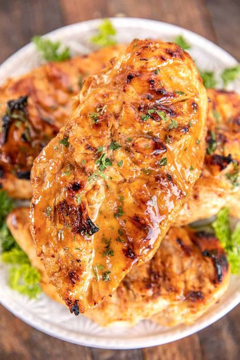 Maple Mustard Grilled Chicken - so simple! Only 6 ingredients - chicken, maple, dijon mustard, lemon juice, paprika, and salt. Let the chicken marinate in the fridge and then grill or cook on the stove. We LOVE this easy chicken. The maple mustard sauce is to-die-for delicious! My husband asks me to make this at least once a week - SO good! #marinade #chicken #grilled #glutenfree Maple Mustard Sauce, Dijon Mustard Chicken, Maple Dijon Chicken, Maple Mustard Chicken, Chicken Marinate, Marinade Chicken, Maple Chicken, Chicken Protein, Chicken Grilled