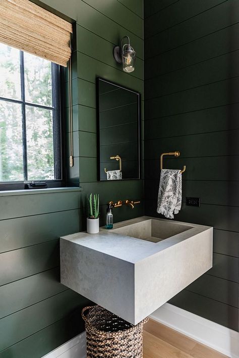 A mix between a deep green and a charcoal, Sherwin Williams Laurel Woods is a gorgeous neutral green. As seen in this bathroom by Oakley Home Builders, the dark tone is perfect for cozy spaces. #oakleyhomebuilders #darkgreen #forestgreen #greenpaint #greenbathroom Forest Wood Sherwin Williams, Sherwin Williams Laurel Woods, Moody Powder Room, Powder Room Paint, Sherwin Williams Green, Dining Room Paint Colors, Dining Room Paint, Cabinet Paint Colors, Bad Inspiration