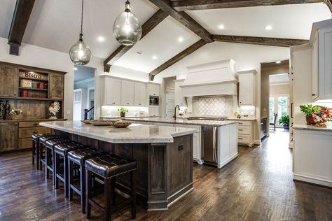 Open concept kitchen with two islands, white shaker cabinets and dark wood flooring Double Island Kitchens, Rustic Contemporary Kitchen, Kitchens With Two Islands, Double Island, Island Kitchens, Vaulted Ceiling Kitchen, Double Island Kitchen, Double Islands, Open Floor Plan Kitchen