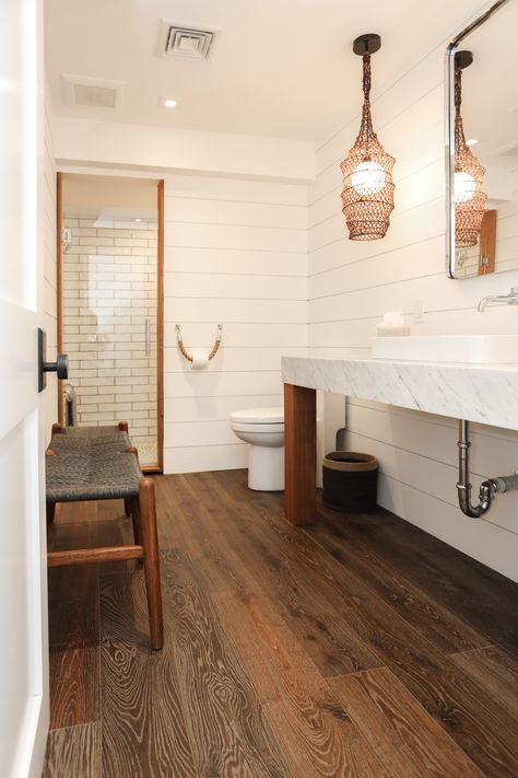 Hardwood Tile Floor Bathroom, White Bathroom With Wood Tile Floor, Small Bathroom Dark Wood Floor, Dark Wood Floor Bathroom Ideas, Hardwood Floor In Bathroom, Bathrooms With Hardwood Floors, Hardwood In Bathroom, White Bathroom Wood Floor, Bathroom With Dark Wood Floors