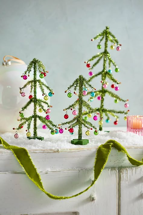 Add sparkling good cheer to your holiday home with this trio of tinsel trees. | Green Tinsel Trees, Set of 3 at Terrain Bright And Merry Christmas Decor, Simple Colorful Christmas Decor, Teal And Pink Christmas Decor, Holiday Office Party Decorations, Children’s Christmas Decorations, Maximalist Decor Christmas, Retro Holiday Decor, Whimsical Christmas Wrapping, Colorful Christmas Tree Decorations