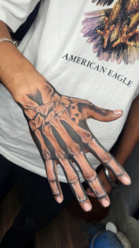 Hand Tattoo Bones Skeleton, Skeloten Hand Tat, Skull Hand Tattoos For Guys, Skull Tattoo On Hand, Skeleton Tattoo Hand, Hand Skull Tattoo, Bone Hand Tattoo, Hand Skull, Skull Hand Tattoo