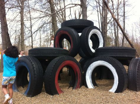 Tire Tower - part of our wonderful playground! We’re so blessed to have four acres of woods, fields and playground equipment at the school! Tyre Playground Ideas, Tires For Playgrounds, Tyres Playground, Tractor Tire Playground, Tyres Playground Outdoor Play, Tire Mountain Playground, Tire Playground, Goat Playground, Diy Kids Playground