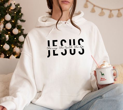 Jesus Christ Hoodie, Trendy Christian Hoodie, Christian Gift, Vertical Cross Hoodie, Pray Hoodie, Trendy Religious Hoodie,Jesus Lover Hoodie   PRODUCT DETAILS 💫Youth Hoodies do not have drawcord for added safety💫 - Our hoodies are made for comfort with a 50% cotton and 50% polyester blend. - They're built to last with a medium-heavy fabric  (8.0 oz/yd² (271 g/m - Enjoy a relaxed fit and a sewn-in label. - Get the right size with our true-to-size guide.   SIZING - Find your perfect fit in our s Jesus Hoodies Aesthetic, Christian Hoodies Aesthetic, Christian Jumpers, Christian Drip, Brat Board, Christian Whispers, Jesus Hoodies, Christian Outfits, Cross Hoodie