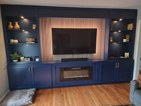 Blue Tv Wall Living Room, Navy Blue Tv Wall, Navy Media Wall, Blue Tv Wall, Tv Wall Unit With Fireplace, Built In Tv Wall, Teal And Burnt Orange, Tv Wall Living Room, Room Panelling