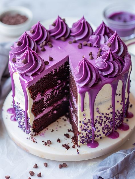 Purple Velvet Cake Recipe 💜💜 Embark on a culinary journey with this stunning Purple Velvet Cake, topped with White Chocolate Cream Cheese Frosting!   𝗜𝗻𝗴𝗿𝗲𝗱𝗶𝗲𝗻𝘁𝘀 🎉  2 1/2 cups all-purpose flour 1 1/2 cups granulated sugar 1 tsp baking soda 1 tsp salt 1 tsp cocoa powder 1 1/2 cups vegetable oil 1 cup buttermilk, at room temperature 2 large eggs, at room temperature 2 tbsp red food coloring 1 tsp white distilled vinegar 1 tsp vanilla extract 1 tsp (or more) purple food coloring Chocolate Cake Purple Decoration, Purple Red Velvet Cake, Purple Velvet Cake, Purple Velvet Cakes, White Chocolate Cream Cheese Frosting, Chocolate Butter Cake, Graduation Cake Designs, White Chocolate Cream, Purple Food Coloring