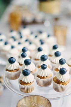 Blue Beauties: Wedding Ideas by Color - www.theperfectpalette.com - The Perfect Palette Goodies Table Ideas, Navy Blue Dessert Table, Blue Dessert Ideas, Blueberry Themed Baby Shower Ideas, Dessert Theme Party, Cupcakes With Blueberries, Mini Cupcakes Wedding, Mini Cupcakes Ideas, Blueberry Birthday Party