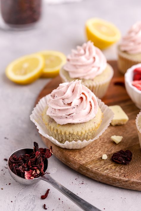 These hibiscus cupcakes are made with lemon and floral hibiscus. They are topped with hibiscus white chocolate buttercream frosting. Herbal Cupcakes, Hibiscus Muffins, Hibiscus Frosting, Hibiscus Buttercream, Hibiscus Cupcakes, Hibiscus Recipes, Strawberry Hibiscus, Simple Sweets, White Chocolate Buttercream Frosting