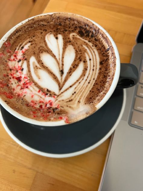 peppermint mocha coffee with latte art and peppermint crumbs on top Peppermint Mocha Aesthetic, Mocha Aesthetic, Mint Coffee, Peppermint Mocha, Book Aesthetics, Gift Exchange, Winter 2024, Carrot Cake, Mocha