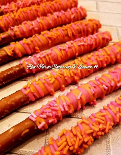 Halloween Dipped Pretzels Rods, Pink And Orange Chocolate Covered Pretzels, Hot Pink Chocolate Covered Pretzels, Pink And White Pretzel Rods, Pink And Orange Halloween, Pretzel Sticks Dipped In Chocolate Pink, Halloween Dip, Pretzel Rods, Pink Orange