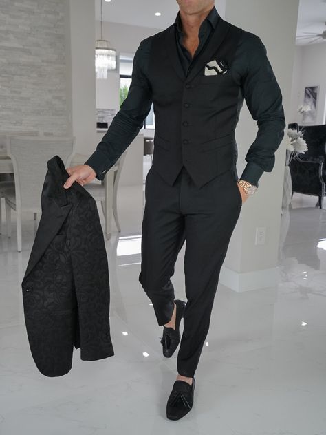 I know everyone is a fan of an all black look! Showcasing our latest Black Paisley 3 piece with a pop of gold! How many black hearts would you give this look? #sebastiancruzcouture #allblackeverything #rosegoldrolex #bespokelife #suitup #mensclothing #mensfashion #menswear #bespoke All Black Prom Outfit Men No Jacket, All Black Suit No Tie, Black Pattern Suit Men, All Black 3 Piece Suit Men, Black Prom Tuxedo Ideas, All Black Semi Formal Outfit Men, All Black Suit Men Prom, All Black Formal, All Black Homecoming Outfit For Guys