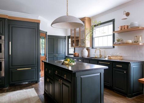 Dark kitchen cabinets are bold, moody, and chic. Find out how to pull off this dramatic look with these stylish dark kitchen cabinet ideas. Urbanology Designs, Dark Green Kitchen, Blue Gray Paint Colors, Rustic Wood Floors, Blue Gray Paint, Devol Kitchens, Dark Kitchen, White Backsplash, Mid Century Modern Kitchen